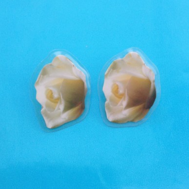 earing white rose